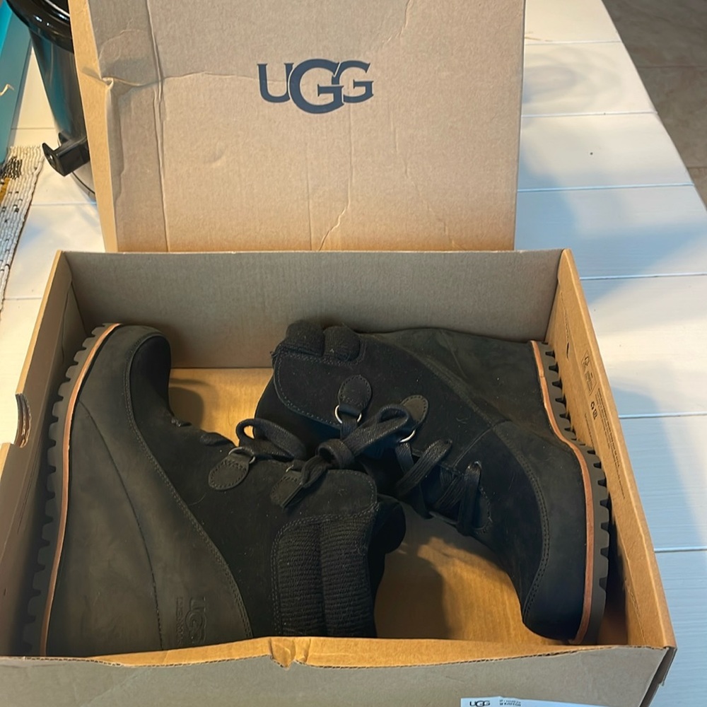 Never worn in box UGG “Kriston” black wedge lace up boots.